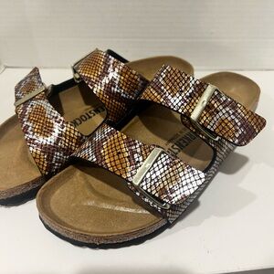 Birkenstock Arizona slides in a python/snake print  Size W 8-8.5